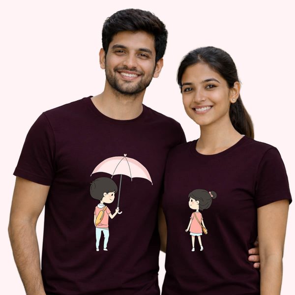 Tender boy sharing his umbrella maroon - the only couple